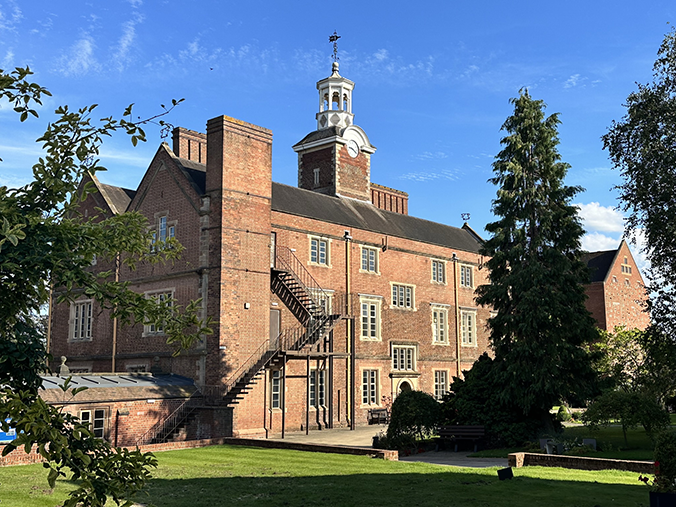 founders building in the middle of school on a bright summer's day