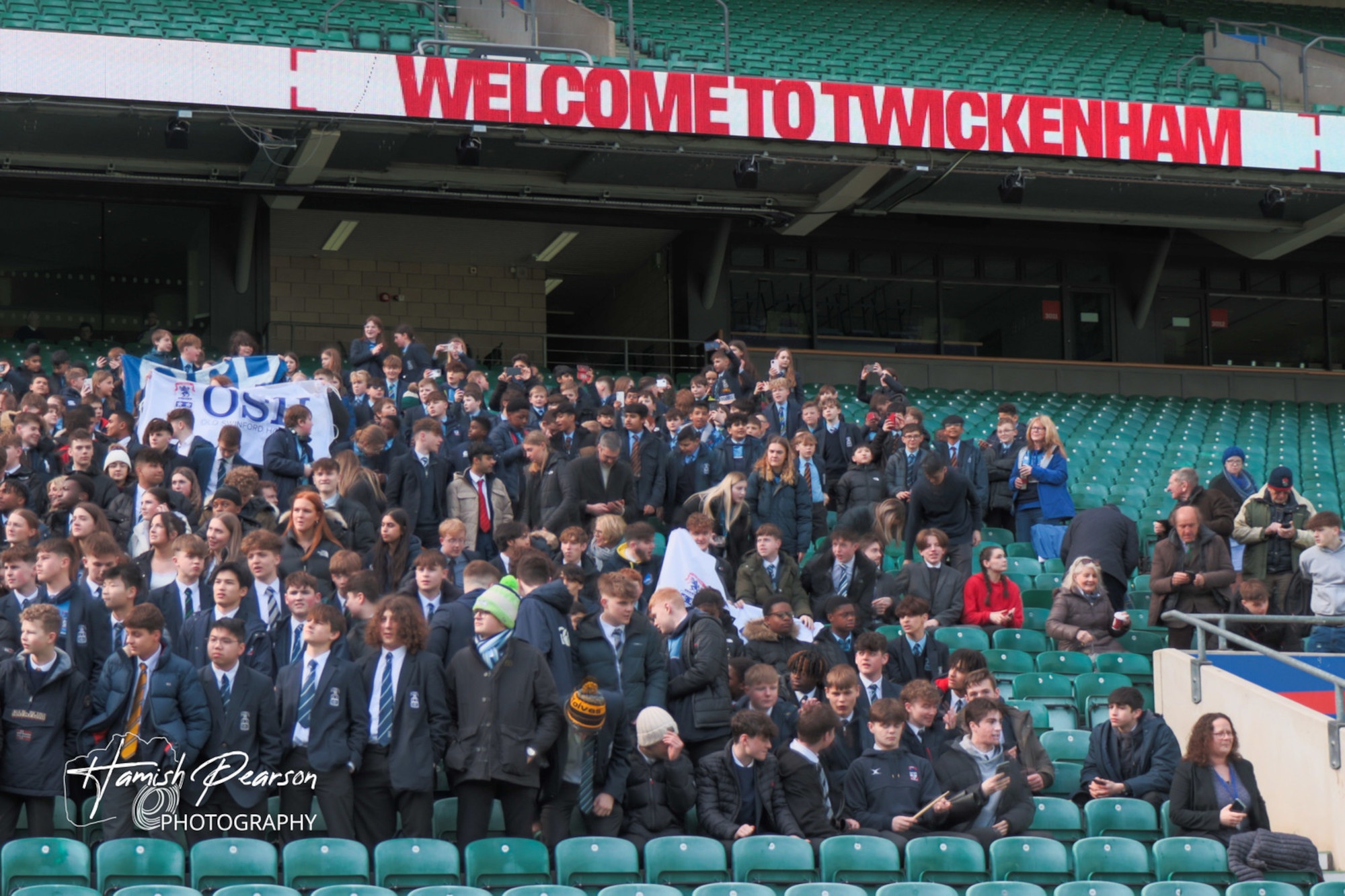 Twickenham rugby stadium with hundreds of OSH student, staff and parent fans cheering on the teams in the national schools rugby finals