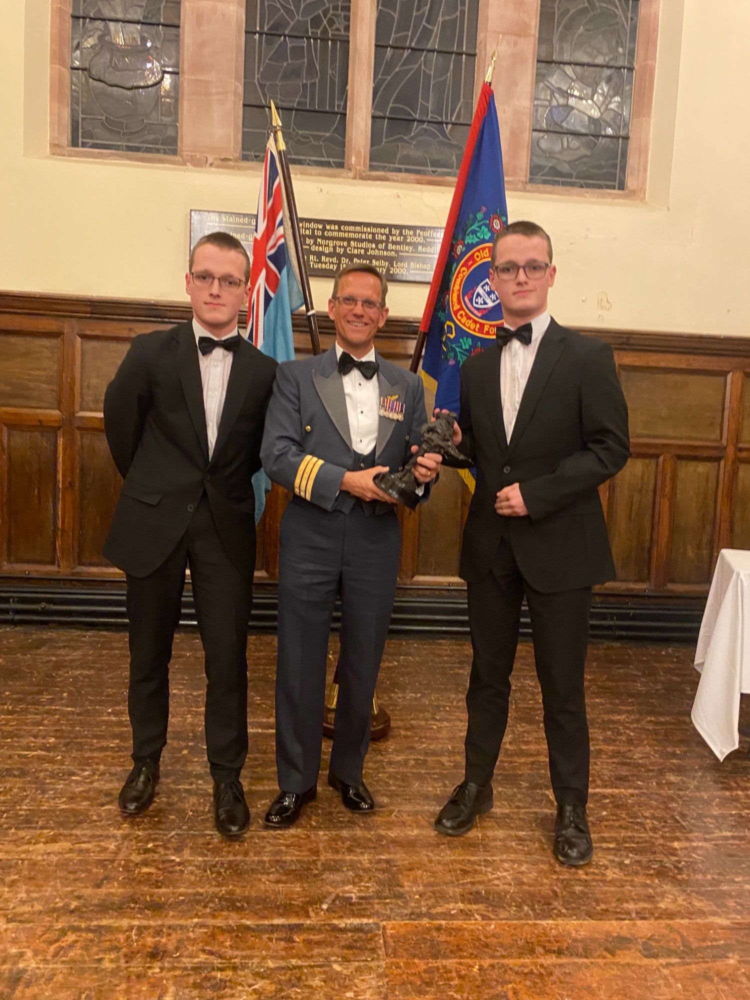 Sgts B and E Oliver collect their Best Trainer award