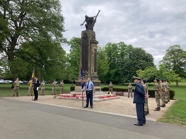 OSH CCF Army and Air Force Cadets stand to attention at Stourbridge War Memorial with flags lowered and heads bowed to observe 2minutes silence