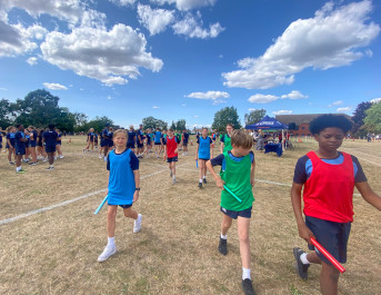 Students gather for the 4x100m relay