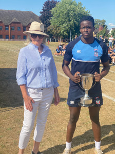 Senior Victrix Ludorum trophy collected on Miles' behalf