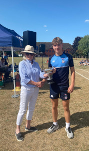 Harry P collects the 1500m trophy