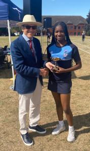 Naomi collects her Junior Victor Ludorum trophy
