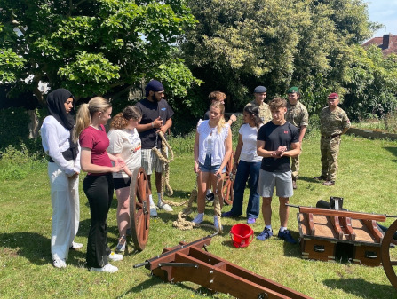 Prefects attempting to assemble a carriage gun